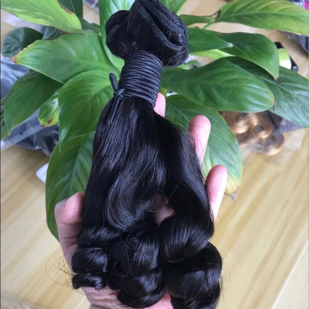Bouncy 100% Brazilian spring curl hair extensions